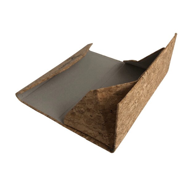 Angled view of the cork fold flat sunglasses case laid open showing how the case folds flat.